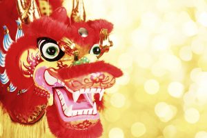 Chinese New Year Decoration--Closeup of Dancing Dragon on festive background.